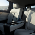 Interior shot of 2025 Mazda CX-90, captain's chairs with white upholstery